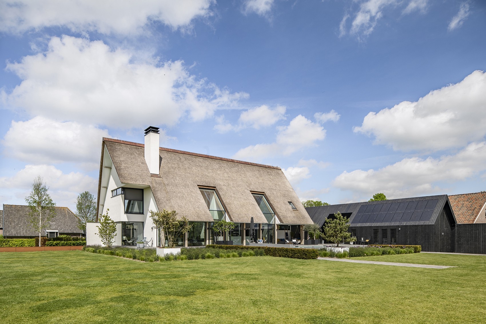 Nieuwbouw woning en schuur Veessen